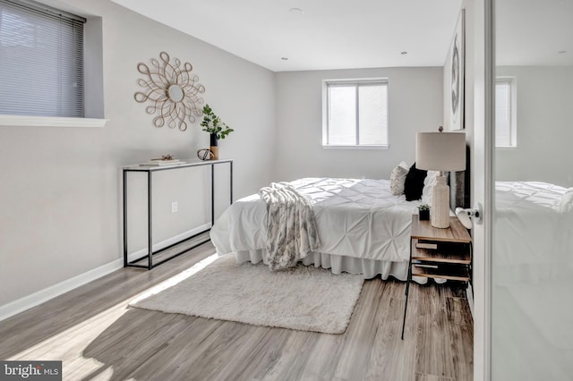 bedroom featuring light hardwood / wood-style flooring