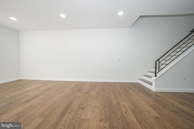 spare room featuring hardwood / wood-style floors