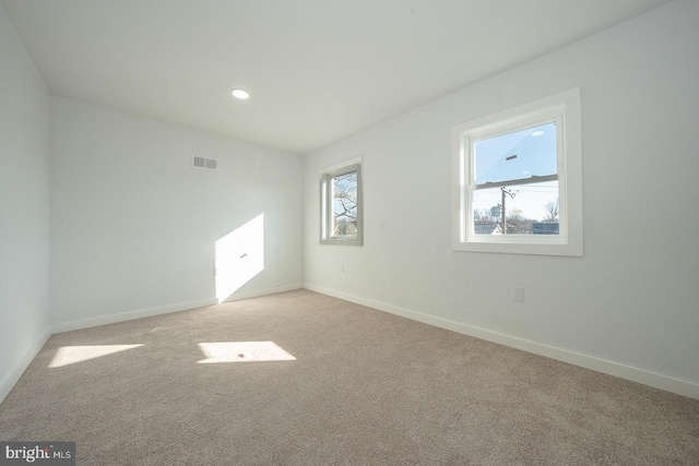 view of carpeted spare room