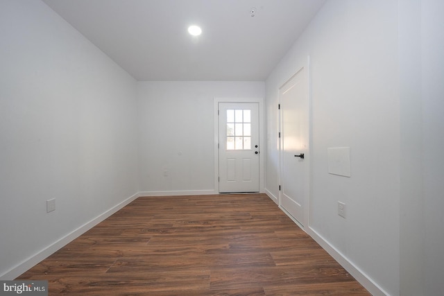 doorway to outside featuring dark hardwood / wood-style flooring