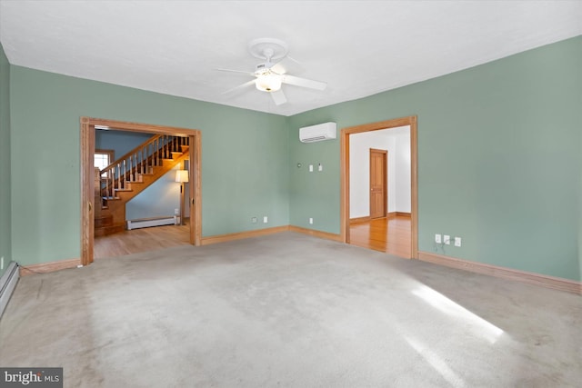 carpeted empty room with a wall unit AC, ceiling fan, and a baseboard heating unit