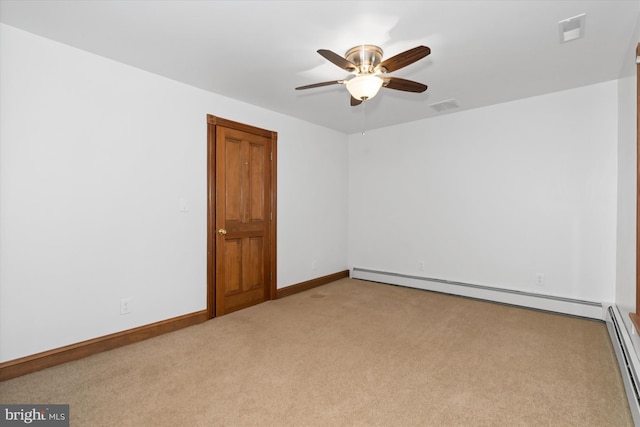 unfurnished room featuring light carpet, ceiling fan, and a baseboard heating unit