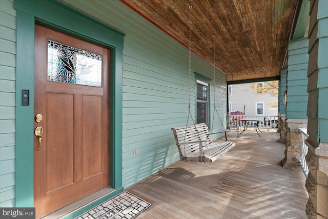 entrance to property with a porch