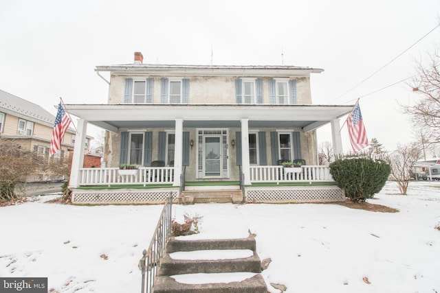 view of front of home featuring covered porch