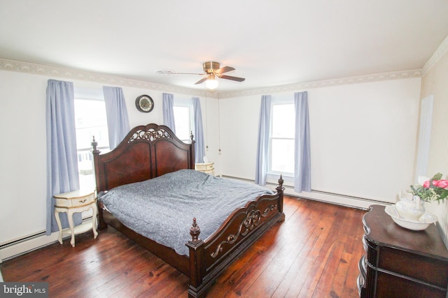 bedroom with a baseboard radiator, ceiling fan, and dark hardwood / wood-style floors