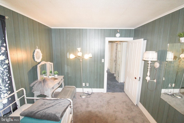 living area featuring ornamental molding and carpet