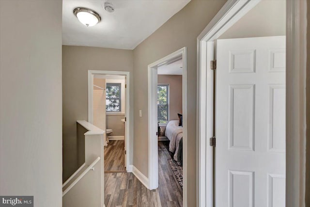 corridor featuring hardwood / wood-style flooring