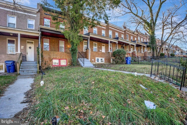 exterior space featuring a front lawn