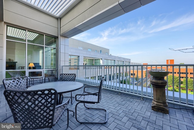 view of patio / terrace with a balcony