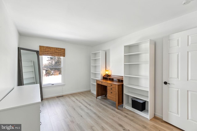 office space featuring light wood-type flooring