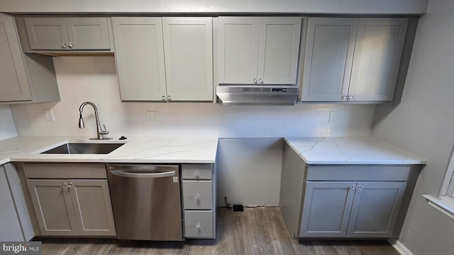 kitchen with dishwasher, dark hardwood / wood-style floors, gray cabinetry, and sink