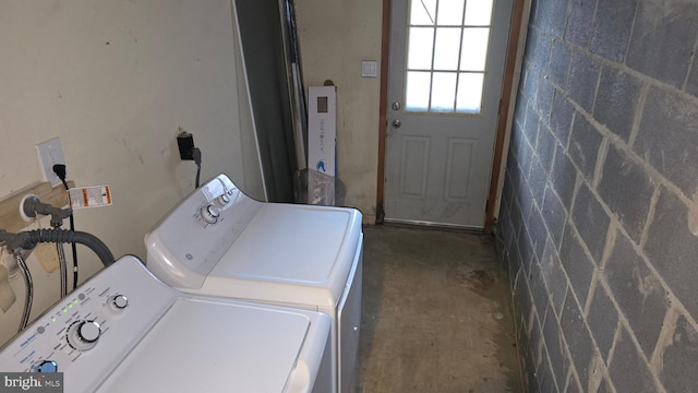 laundry room with washer and clothes dryer