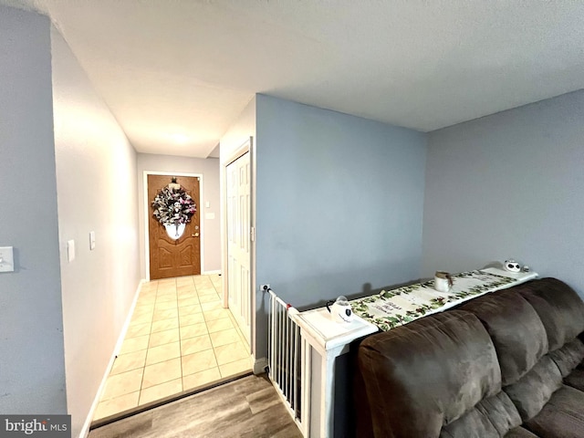 bedroom featuring light wood-type flooring and a closet