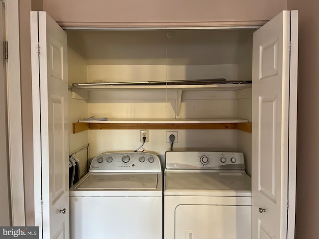 laundry area featuring washer and clothes dryer