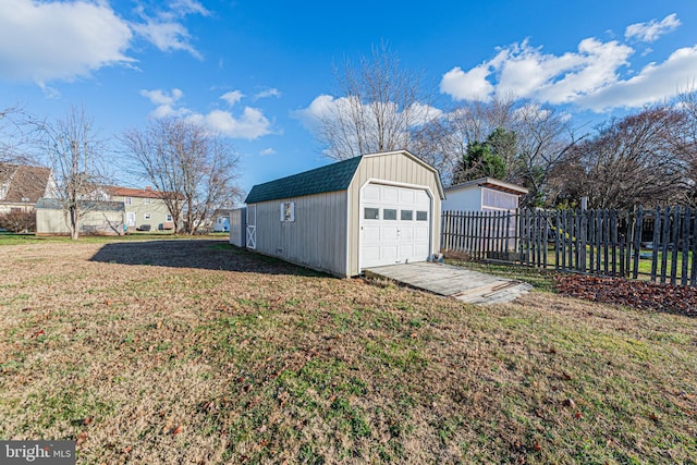 garage with a lawn