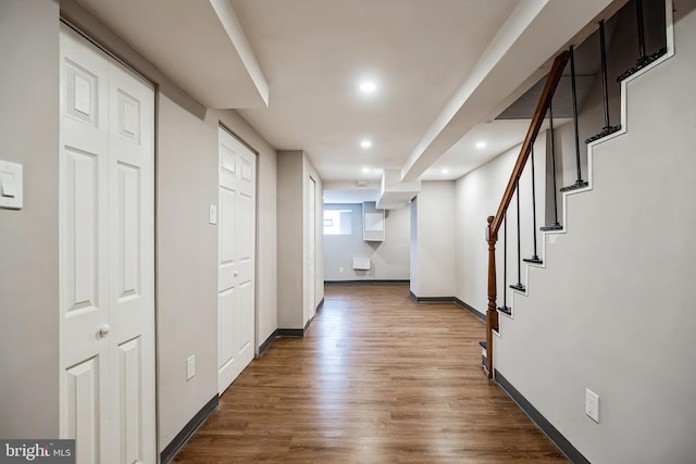 hallway featuring wood-type flooring