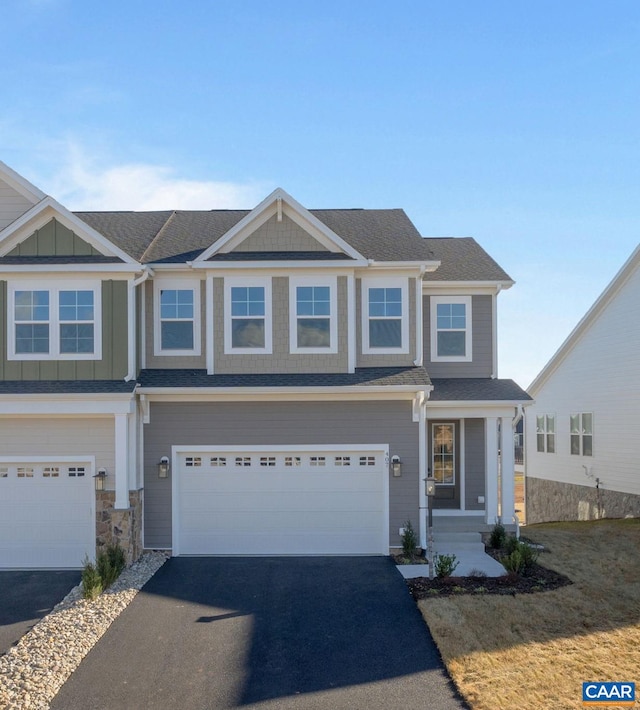 view of front of property featuring a garage