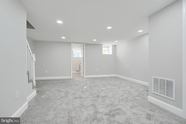 basement with light carpet