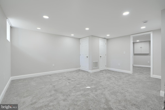 basement featuring carpet floors