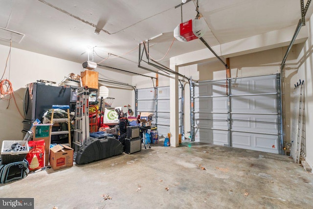 garage featuring a garage door opener