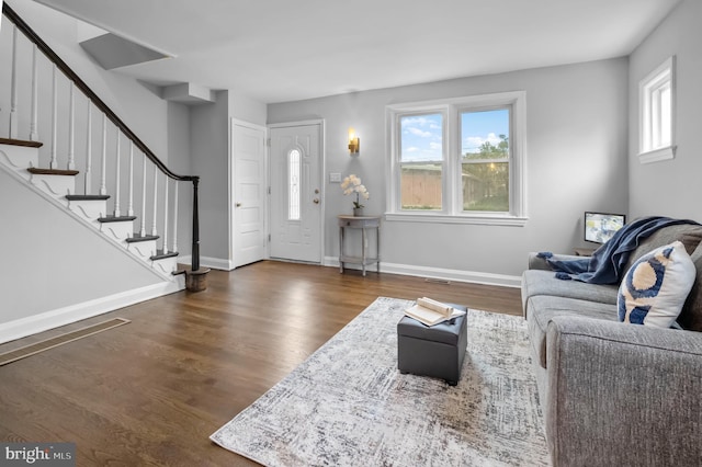 living room with dark wood-type flooring