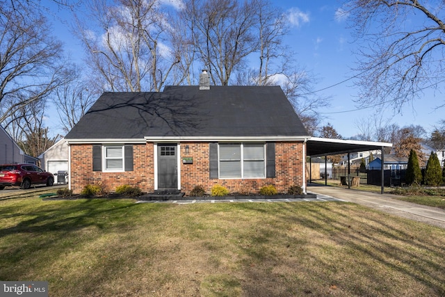 view of front of house with a carport, a front yard, brick siding, and a chimney