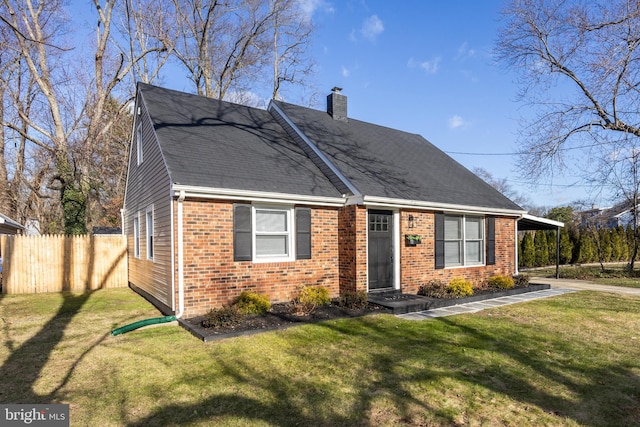 view of front of house with brick siding, a chimney, a shingled roof, fence, and a front lawn