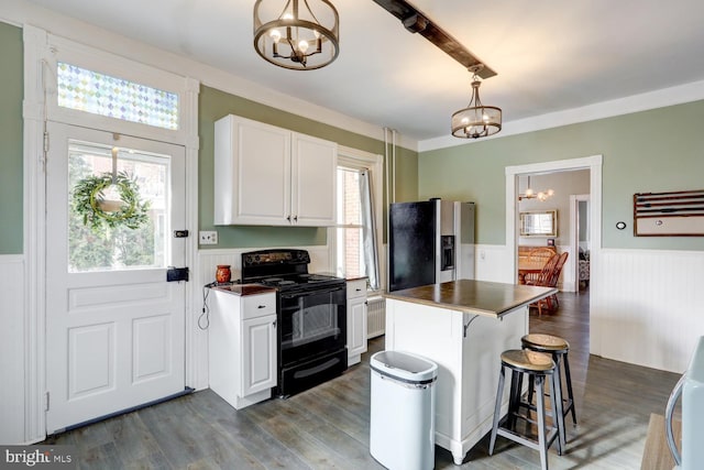 kitchen with electric range, decorative light fixtures, white cabinetry, and stainless steel fridge with ice dispenser