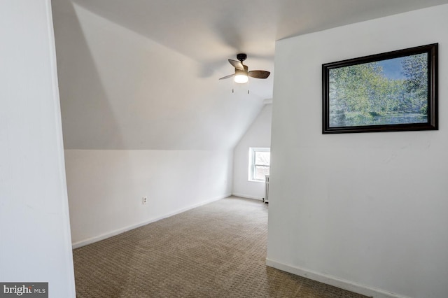 bonus room featuring ceiling fan, lofted ceiling, and carpet floors