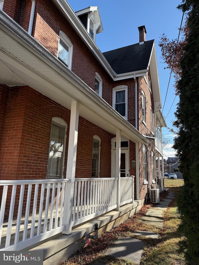 view of home's exterior with a porch