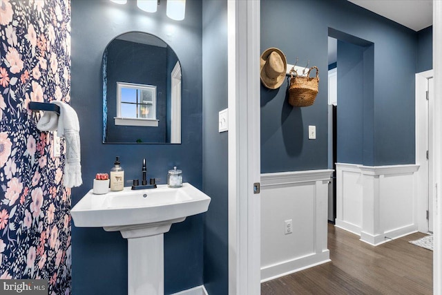 bathroom featuring hardwood / wood-style flooring