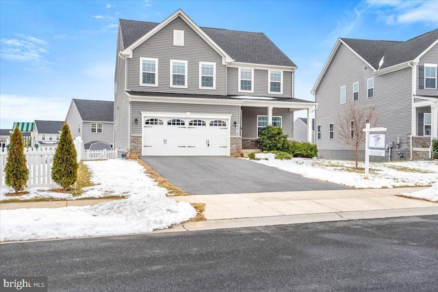 view of front of home featuring a garage