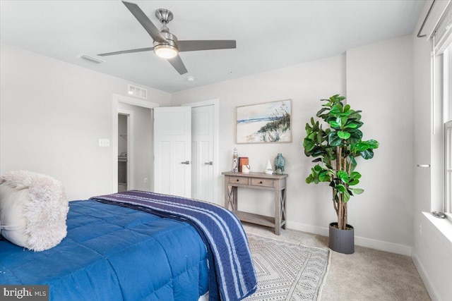 bedroom with ceiling fan and carpet flooring