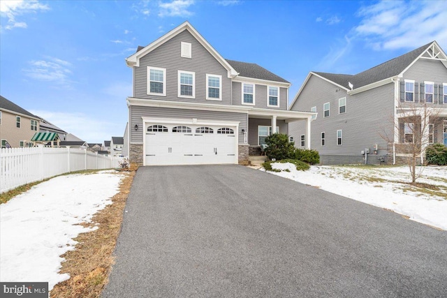 view of front of property featuring a garage