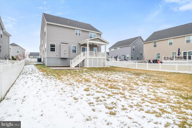 view of snow covered house