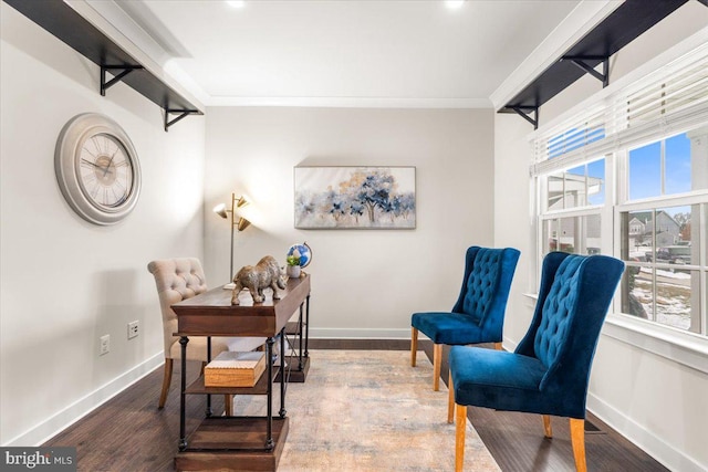 office with ornamental molding and hardwood / wood-style floors