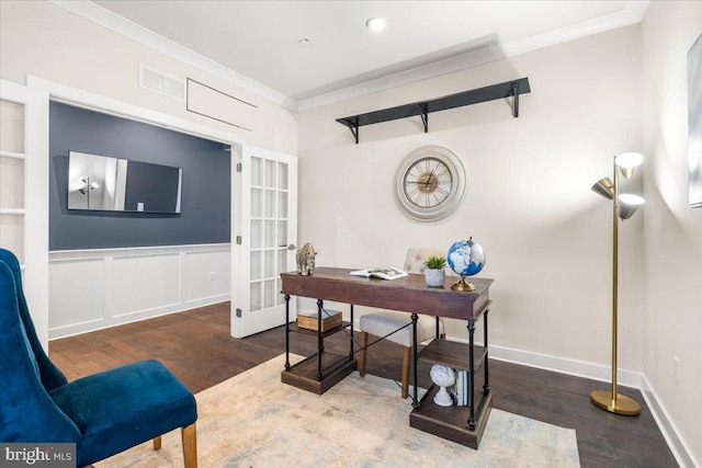 office featuring dark hardwood / wood-style flooring, crown molding, and french doors