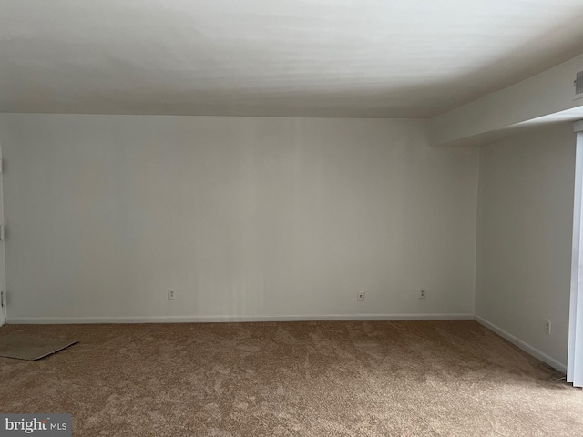 view of carpeted spare room