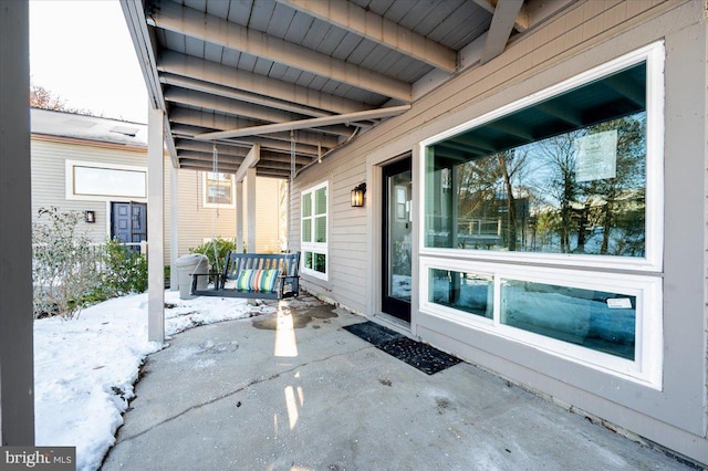 view of snow covered patio