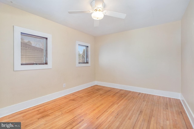 unfurnished room featuring ceiling fan and light hardwood / wood-style flooring