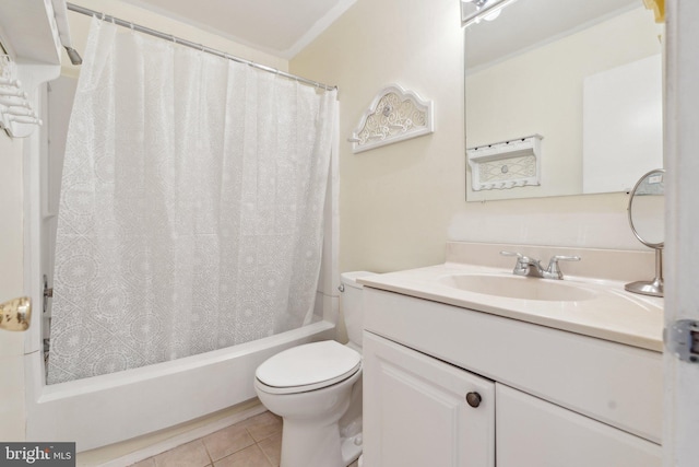 full bathroom featuring vanity, tile patterned floors, shower / bath combo with shower curtain, and toilet