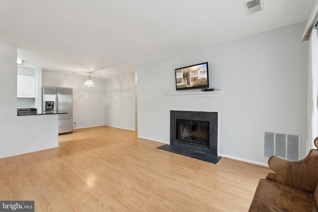 living room with light wood-type flooring