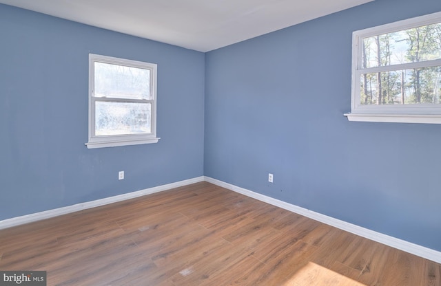 empty room featuring hardwood / wood-style floors