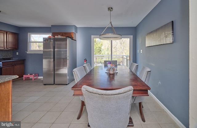 view of tiled dining space