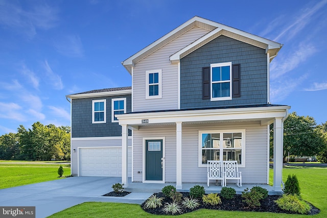 view of property featuring a front lawn, a porch, and a garage