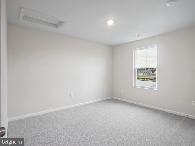 view of carpeted spare room