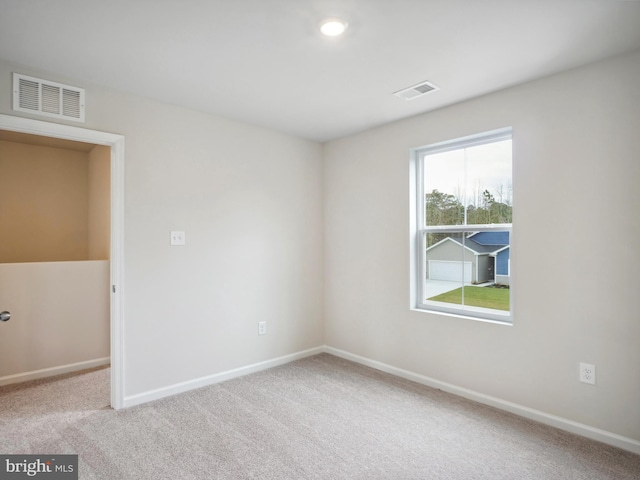 view of carpeted spare room