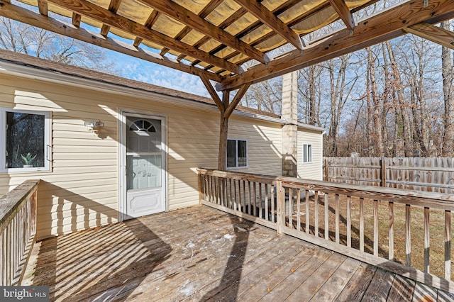 wooden terrace with a pergola