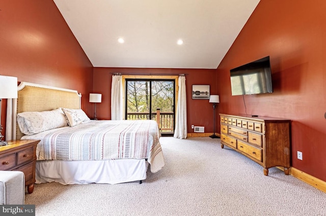 carpeted bedroom with lofted ceiling and access to outside