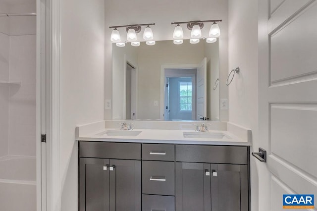 bathroom featuring shower / bathing tub combination and vanity